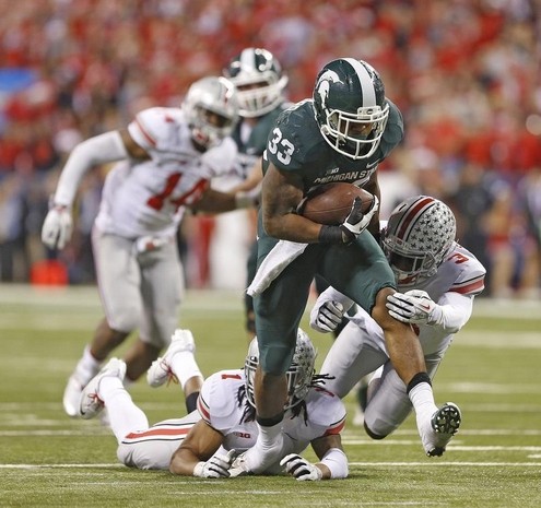 Sealing Victory: Jeremy Langford runs in for a touchdown with 2 minutes left. 